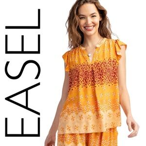 531:  EASEL NWT TOP TANGERINE (R2A)